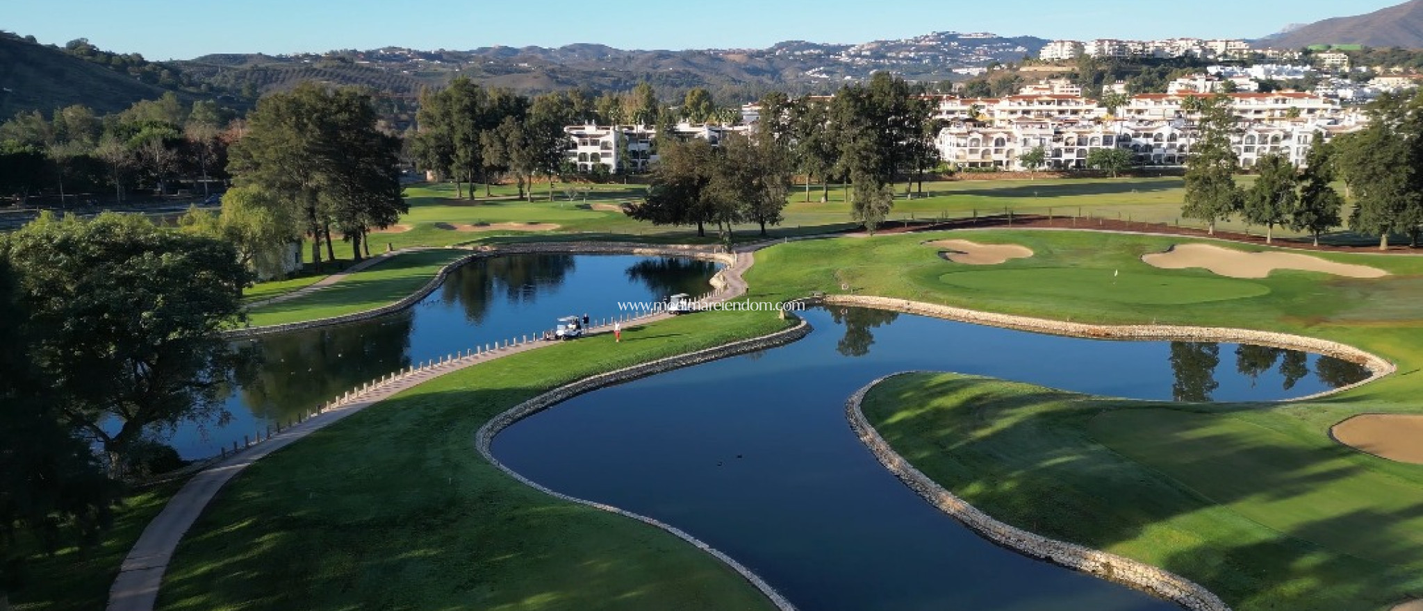 Новостройки - Квартира на первом этаже - Las Lagunas de Mijas